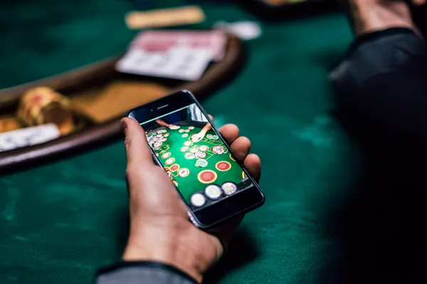 A glowing roulette wheel with cascading chips, symbolizing the engaging live and instant-win games available on LG111.